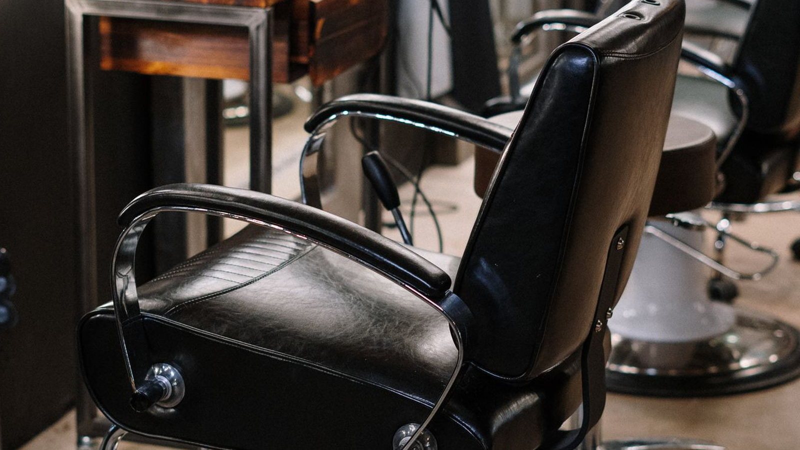 Sharp & Sons barbershop interior — illustrative photo